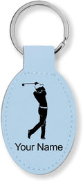 LaserGram Oval Keychain, Golfer Golfing, Personalized Engraving Included (Light Blue)