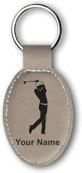 LaserGram Oval Keychain, Golfer Golfing, Personalized Engraving Included (Light Brown)