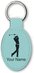 LaserGram Oval Keychain, Golfer Golfing, Personalized Engraving Included (Teal)