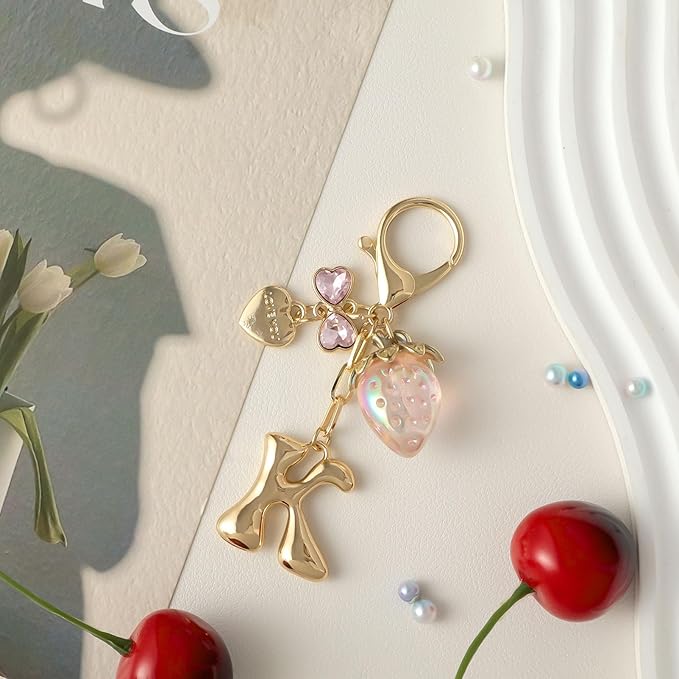 Snycler Bubble Initial Keychain with Strawberry & Bow- Gold Letter Bag Charms for Women, Cute Purse Handbag Accessories