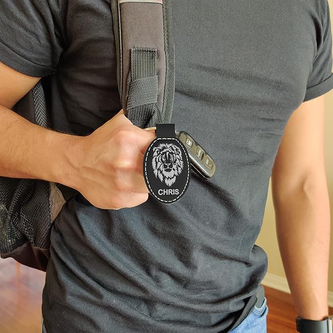 LaserGram Oval Keychain, Golfer Golfing, Personalized Engraving Included (Black with Silver)