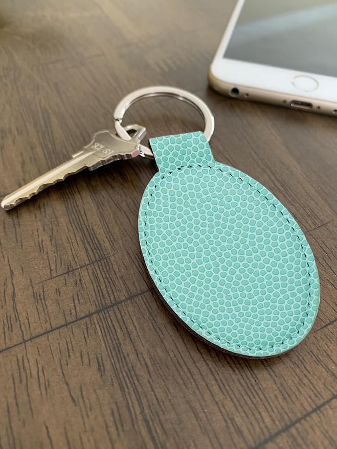 LaserGram Oval Keychain, Golf Ball, Personalized Engraving Included (Basketball Teal)