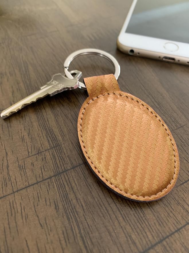 LaserGram Oval Keychain, Golfer Golfing, Personalized Engraving Included (Carbon Fiber Bronze)