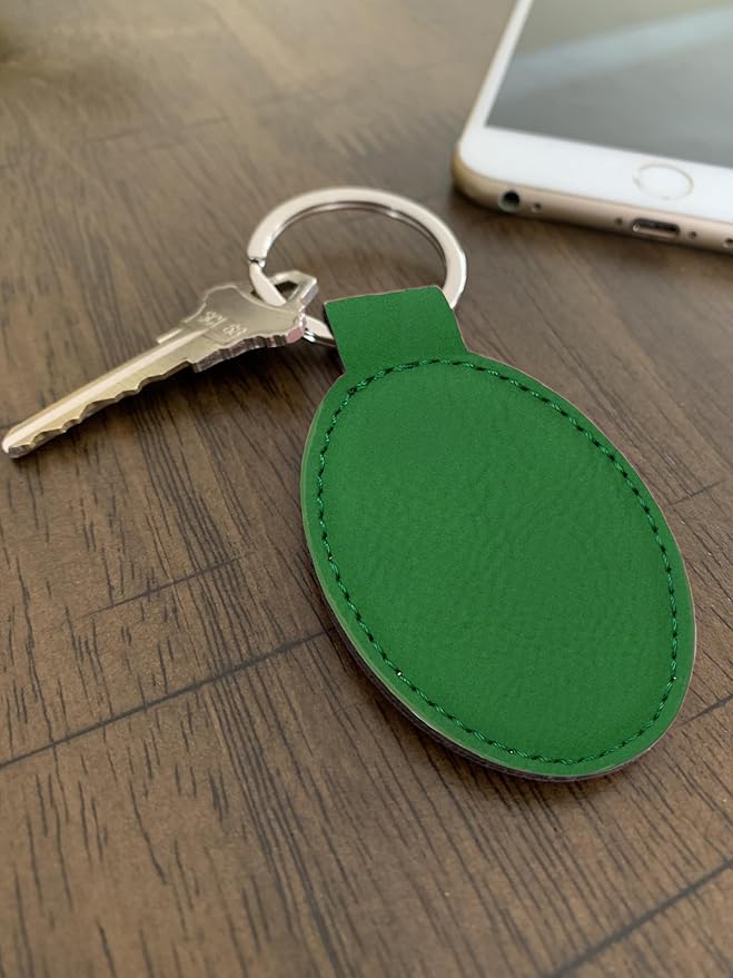 LaserGram Oval Keychain, Golfer Golfing, Personalized Engraving Included (Green)