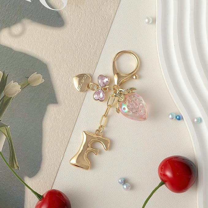 Snycler Bubble Initial Keychain with Strawberry & Bow- Gold Letter Bag Charms for Women, Cute Purse Handbag Accessories