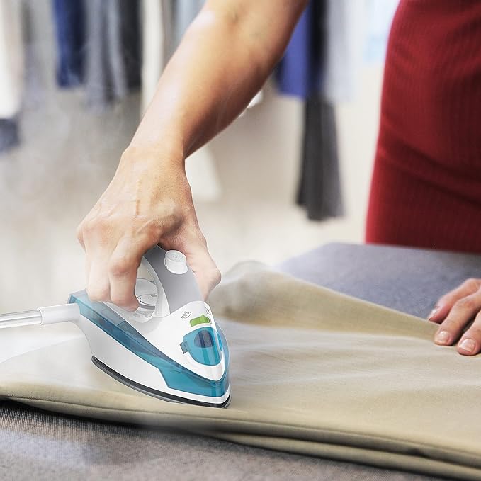 Steamfast SF-710 Mini Steam Iron, Non-Stick Sole Plate, Foldable Handle, 45 Second Heat Up Time, Cord Storage, Portable, 6-Foot Power Cord, Chemical-Free Steam Power, White