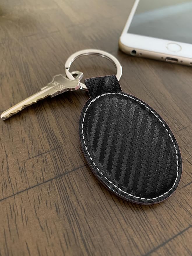 LaserGram Oval Keychain, Golfer Golfing, Personalized Engraving Included (Carbon Fiber Black with Silver)