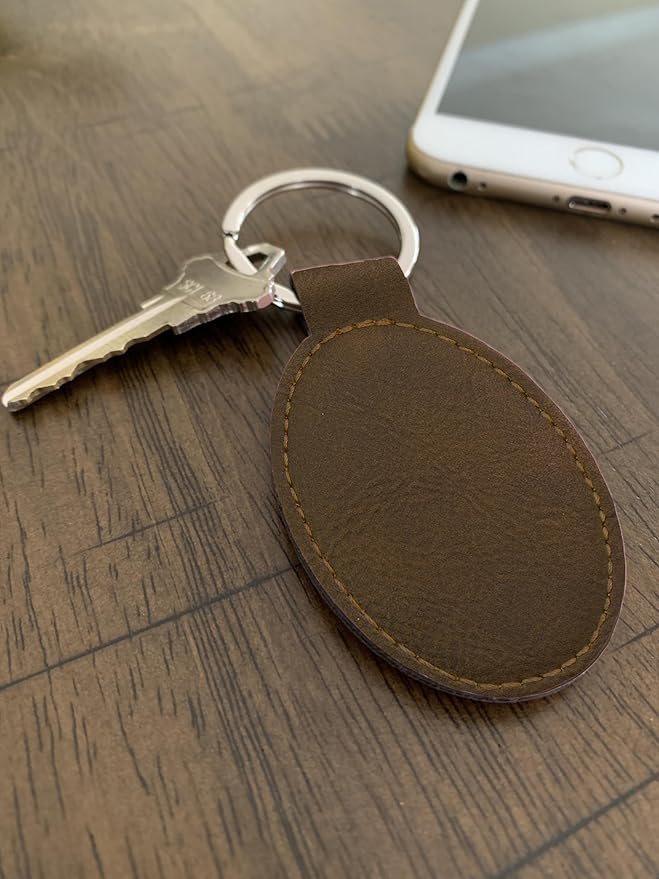 LaserGram Oval Keychain, Golfer Golfing, Personalized Engraving Included (Chocolate Brown)