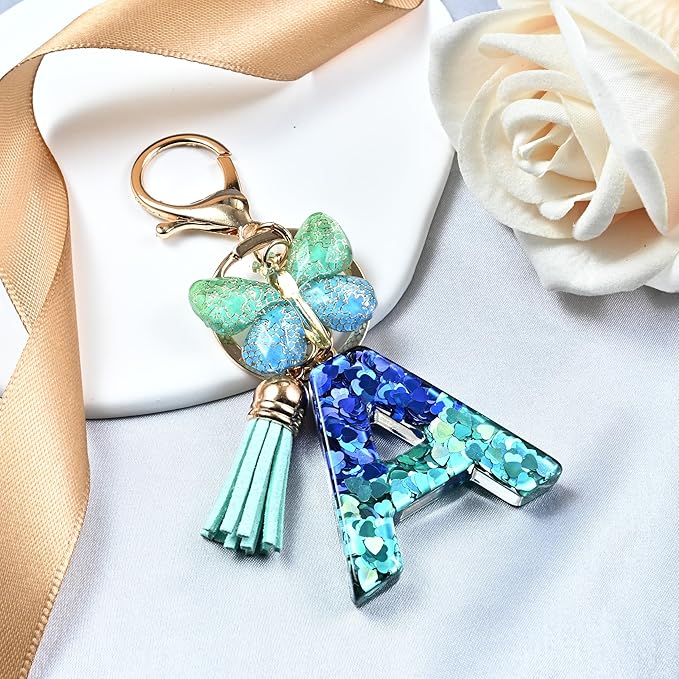 JINGUAZI Initial letter Keychains for Women Tassel Butterfly Pink Purple Cute Car Keychain for Wallet Backpack bag charm