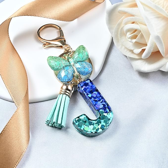 JINGUAZI Initial letter Keychains for Women Tassel Butterfly Pink Purple Cute Car Keychain for Wallet Backpack bag charm