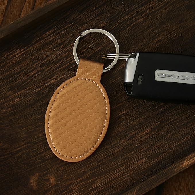LaserGram Oval Keychain, Golfer Golfing, Personalized Engraving Included (Carbon Fiber Bronze)