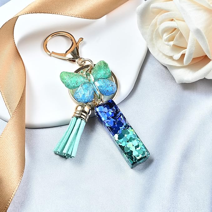 JINGUAZI Initial letter Keychains for Women Tassel Butterfly Pink Purple Cute Car Keychain for Wallet Backpack bag charm