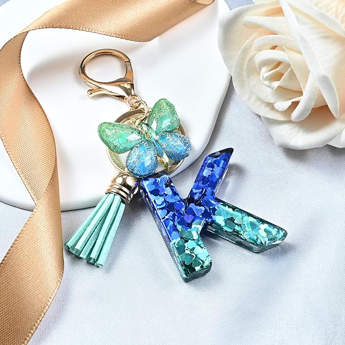 JINGUAZI Initial letter Keychains for Women Tassel Butterfly Pink Purple Cute Car Keychain for Wallet Backpack bag charm